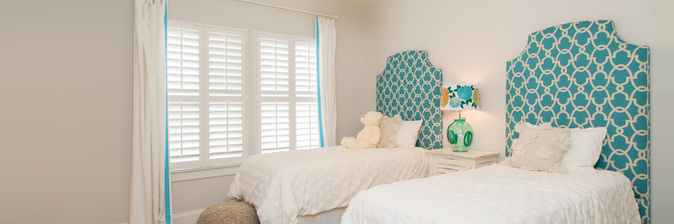 Plantation shutters in a bedroom